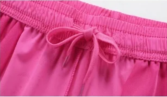 Short de sport femme à poche zippée