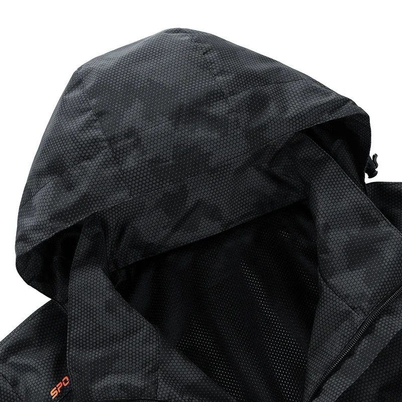Veste de randonnée imperméable à capuche amovible