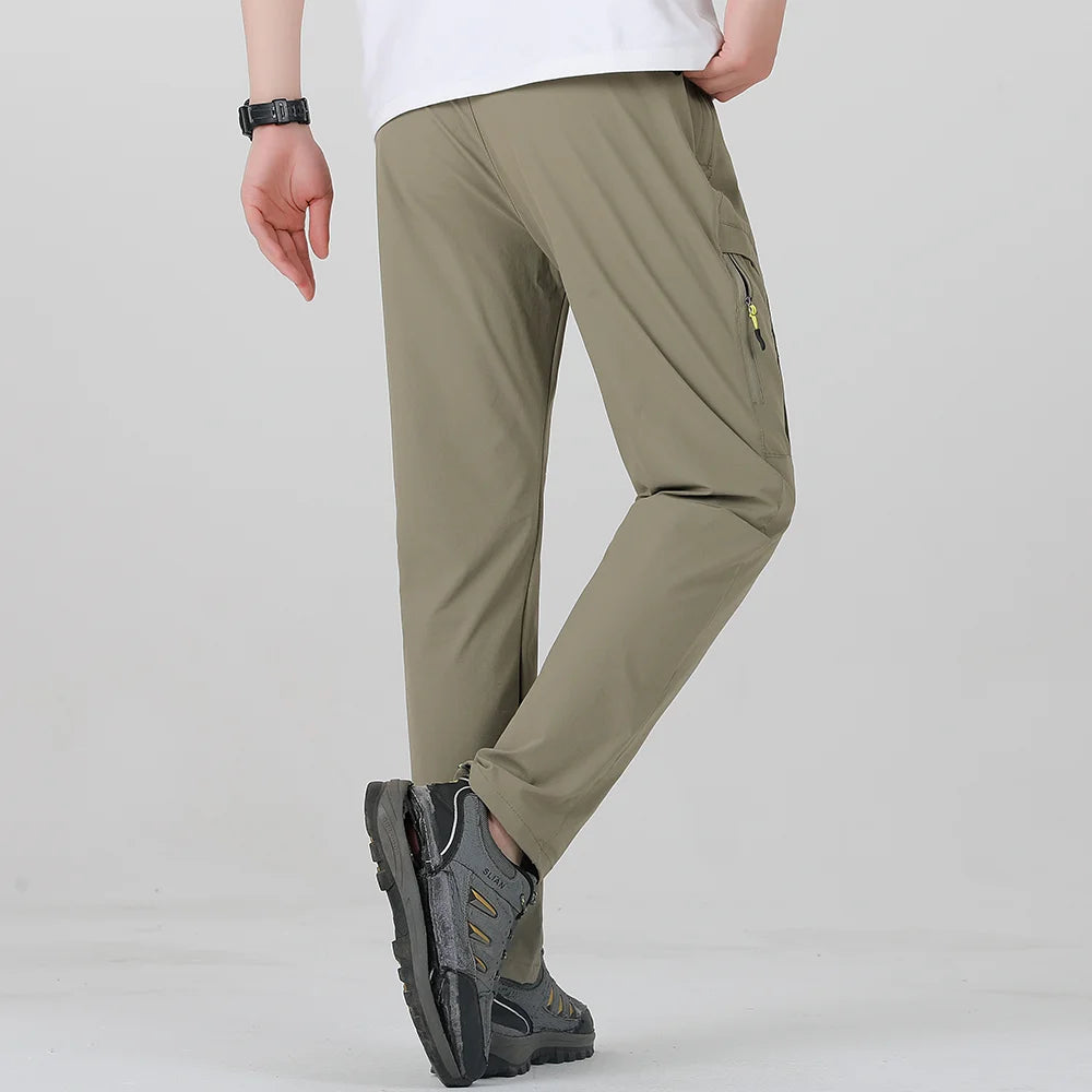 Pantalon de trekking extensible homme à poches zippées