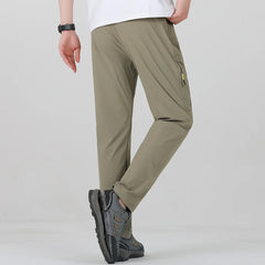 Pantalon de trekking extensible homme à poches zippées